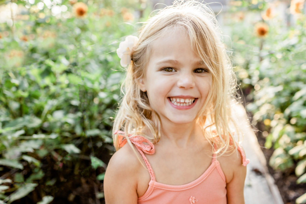 Little girl in flower field in Bernardsville, NJ