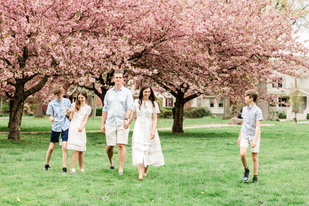 Family photo during spring with cherry blossom trees in Westfield NJ