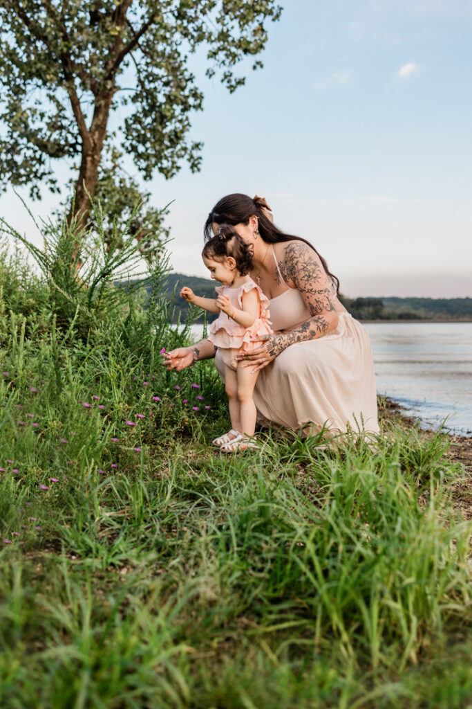 Quiet moment in nature between mother and baby girl in Somerset County, NJ