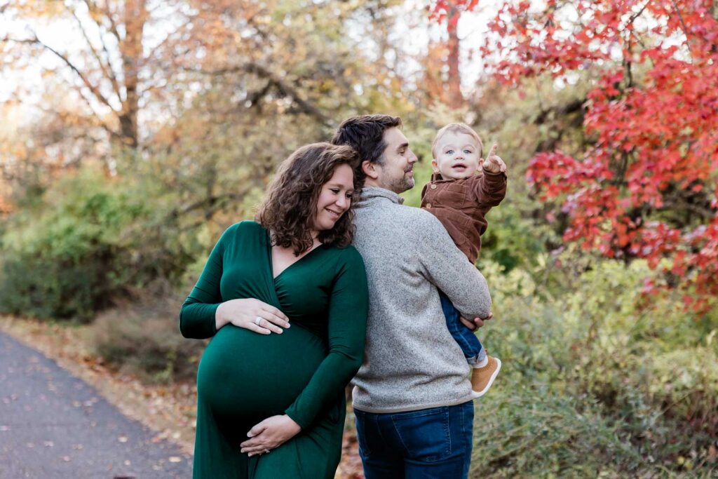 Family enjoying an easygoing, relaxed maternity session in Union County, NJ